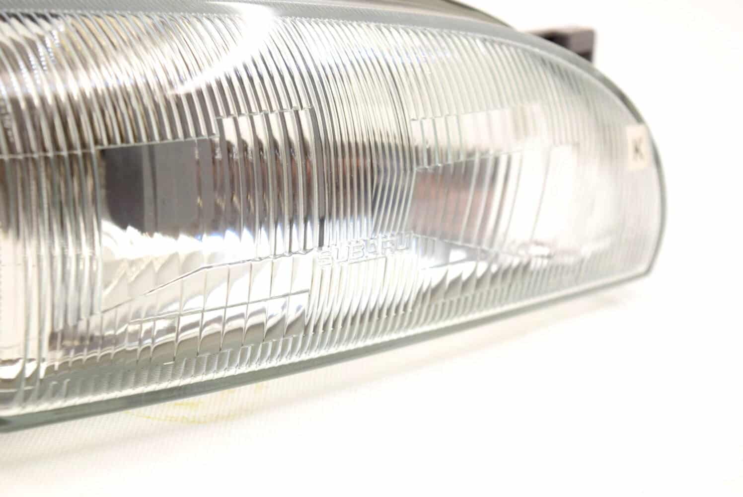 84001FA080 Lampa przednia prawa OEM Subaru Impreza GC8 94-96