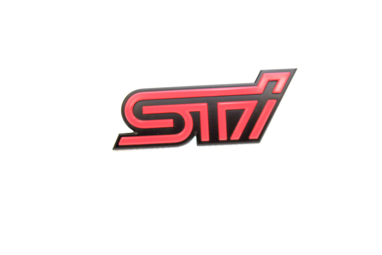 93013FE120 Emblemat grilla przedniego Subaru Impreza STI 04-05