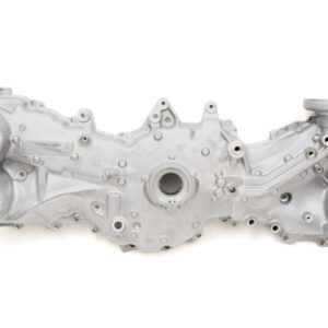 Aluminum automotive engine block with multiple circular bores and mounting points against a white background.